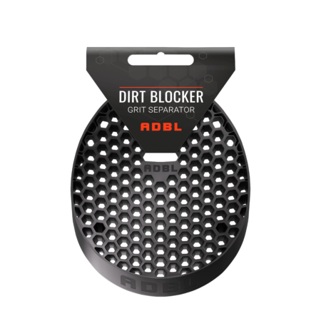 A black, concave, honeycomb-shaped, perforated black dirt blocker for installation in detailing buckets.