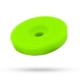 A lime green foam polishing pad suspended in the air against a white background.